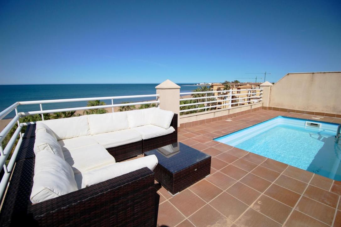 Atico Con Piscina Privada En Primera Linea Apartment Denia Bagian luar foto