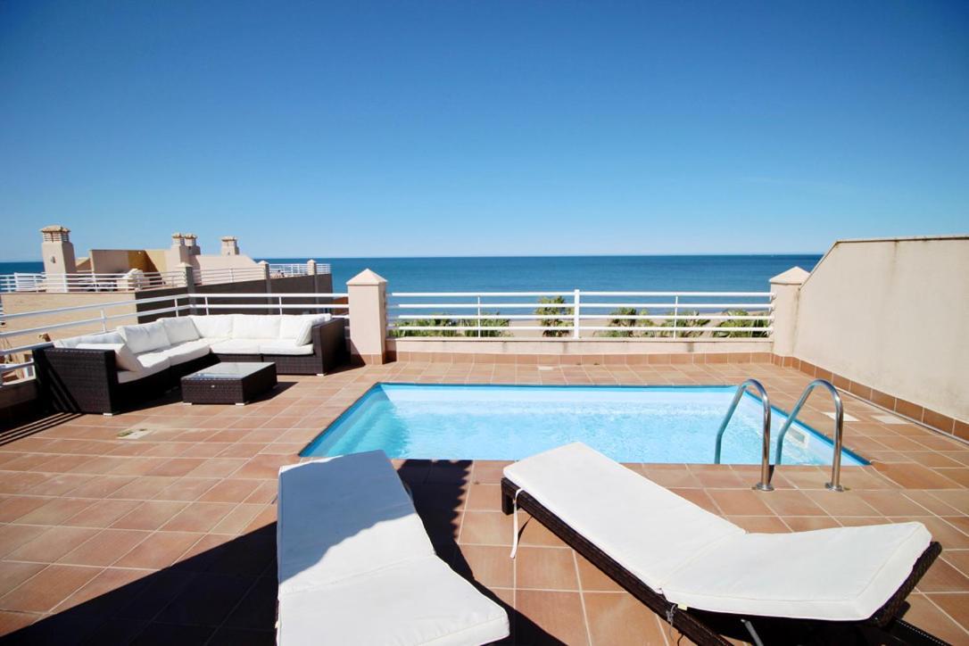 Atico Con Piscina Privada En Primera Linea Apartment Denia Bagian luar foto
